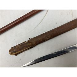 George V 1897 pattern Army Officer's sword by Henry Wilkinson Pall Mall London, the 82.5cm 'London Made' blade etched to both sides with Royal Crests and cyphers etc, pierced half-basket hilt with wire-bound fish skin grip and remains of leather knot strap; in leather covered field service scabbard L101cm overall; and two 14th Prince of Wales Own swagger sticks (3)