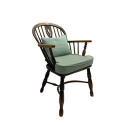 Late 19th century elm Windsor armchair, stick back with pierced and fretwork splat, turned supports joined by crinoline stretcher