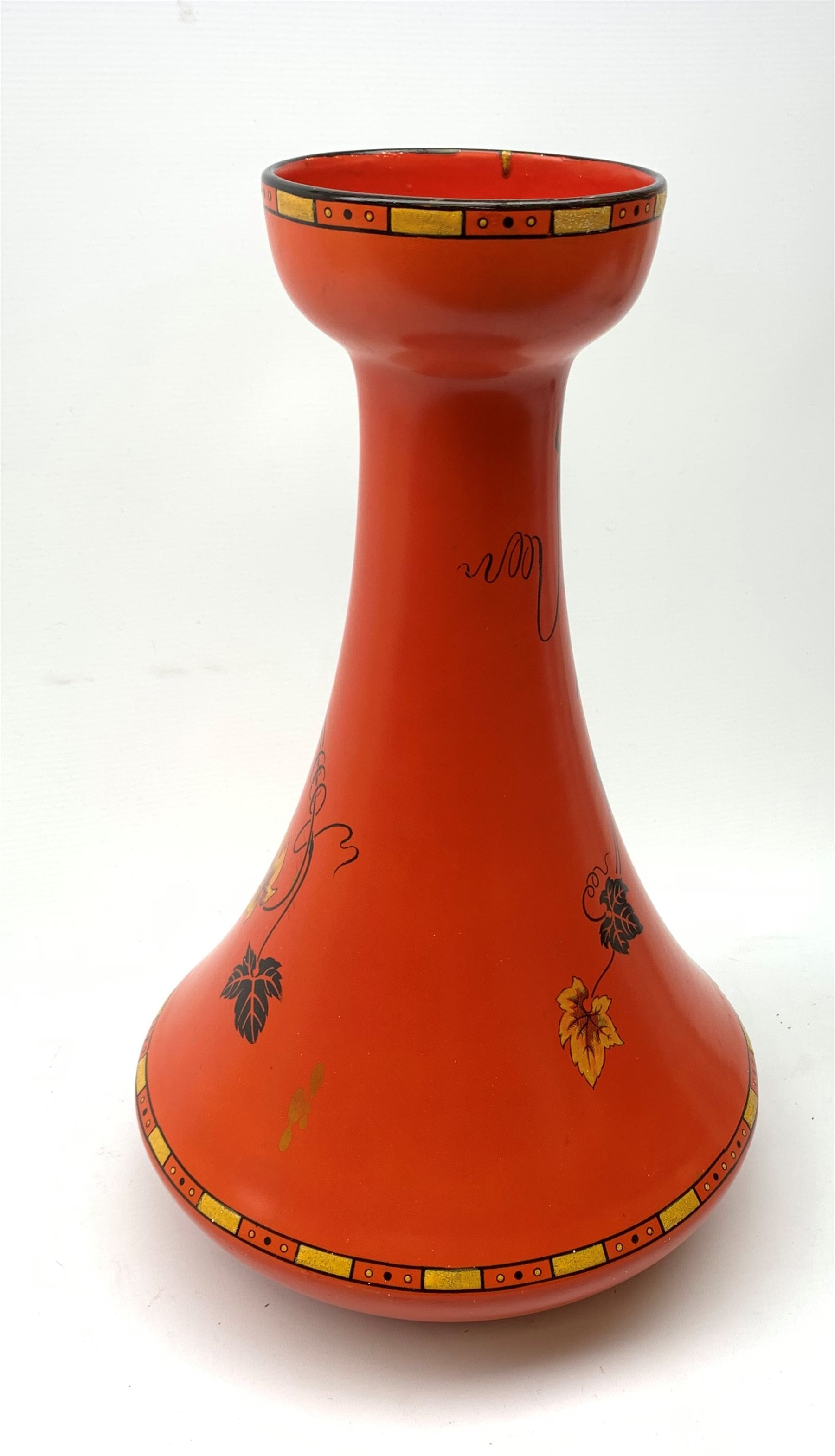 A large Shelley vase, of bulbous form with waisted neck and flared rim, the red ground decorated with the Vine and Grape pattern, with printed mark beneath and painted pattern no 8632, H41cm. 