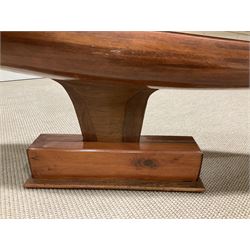 Large pond yacht with simulated planked mahogany deck, mahogany hull, wooden keel and stern fin and tubular aluminium mast with two sails; on wooden stand L131cm H on stand 177cm