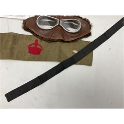 WW1 British Army Derby Scheme 1915 Attested armband; beret with East Yorkshire cap badge; pair of fur lined leather flying/motorcycle goggles; HMS Pembroke cap band; and small quantity of RNAS cloth and metal badges etc