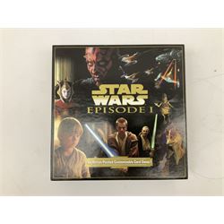 Star Wars - Disney Store The Force Awakens figurine playset, Poe's X-Wing Fighter, Snowspeeder and First Order Tie Fighter; Solo figurine set; The Last Jedi Elite Series die-cast action figure of Praetorian Guard; all mint and boxed; together with Star Wars Episode 1 card game, boxed (7)