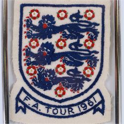 1960s three lions embroidered cloth badge from an England football shirt, reading F.A. Tour 1961, framed