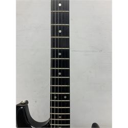 Encore black electric cut-away guitar L96cm; and Spanish Victor Garcia model 187 acoustic guitar, bears label dated 1972 L99cm; each in soft carrying case (2)