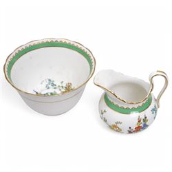 1930s Plant & Co Tuscan china tea set painted with flowers in blue, pink etc within a green border comprising twelve cups and saucers, twelve plates, two bread and butter plates, milk jug and sugar bowl (40)