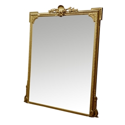 Large late 19th century gilt wood and gesso framed mirror, shell and foliage pediment with ribbon, husk moulded corner brackets, 138cm x 168cm  