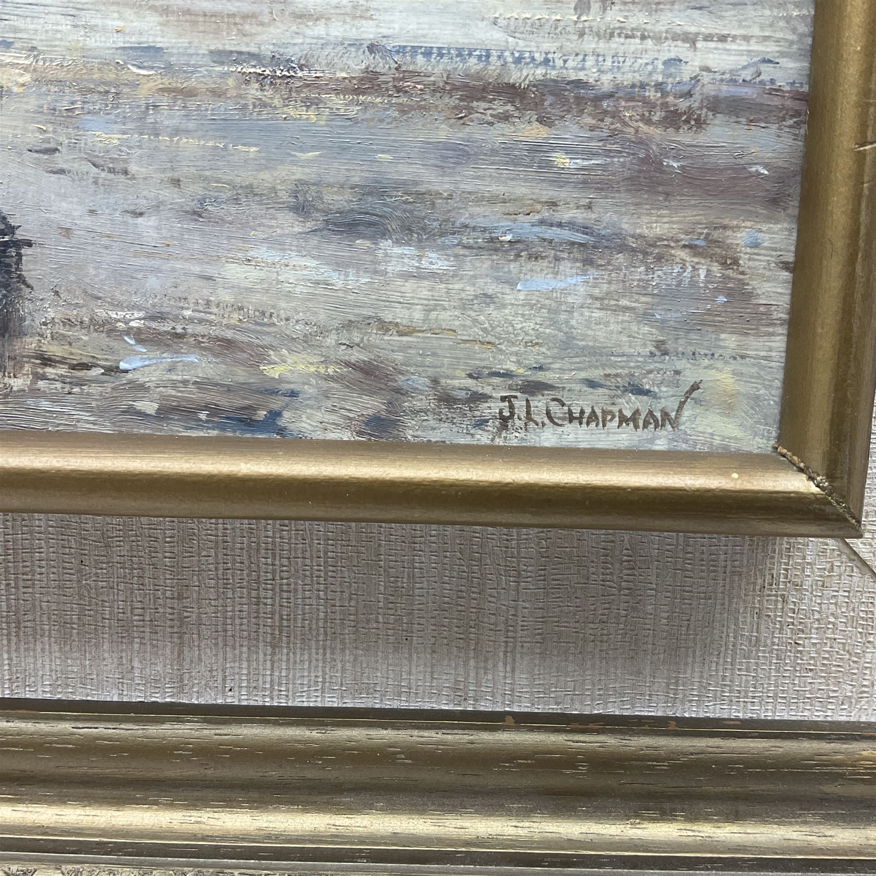 John Lewis Chapman (British 1946-): A Sunset Ride on the Beach, oil on board signed 24cm x 40cm