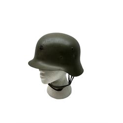 WWII Spanish combat steel helmet model Z, with leather lining and canvas strap, interior D22cm 