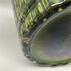 Jardiniere and stand, the jardiniere modelled as a pale, the stand with foliate and foliage decoration on a green ground, stand H73cm 