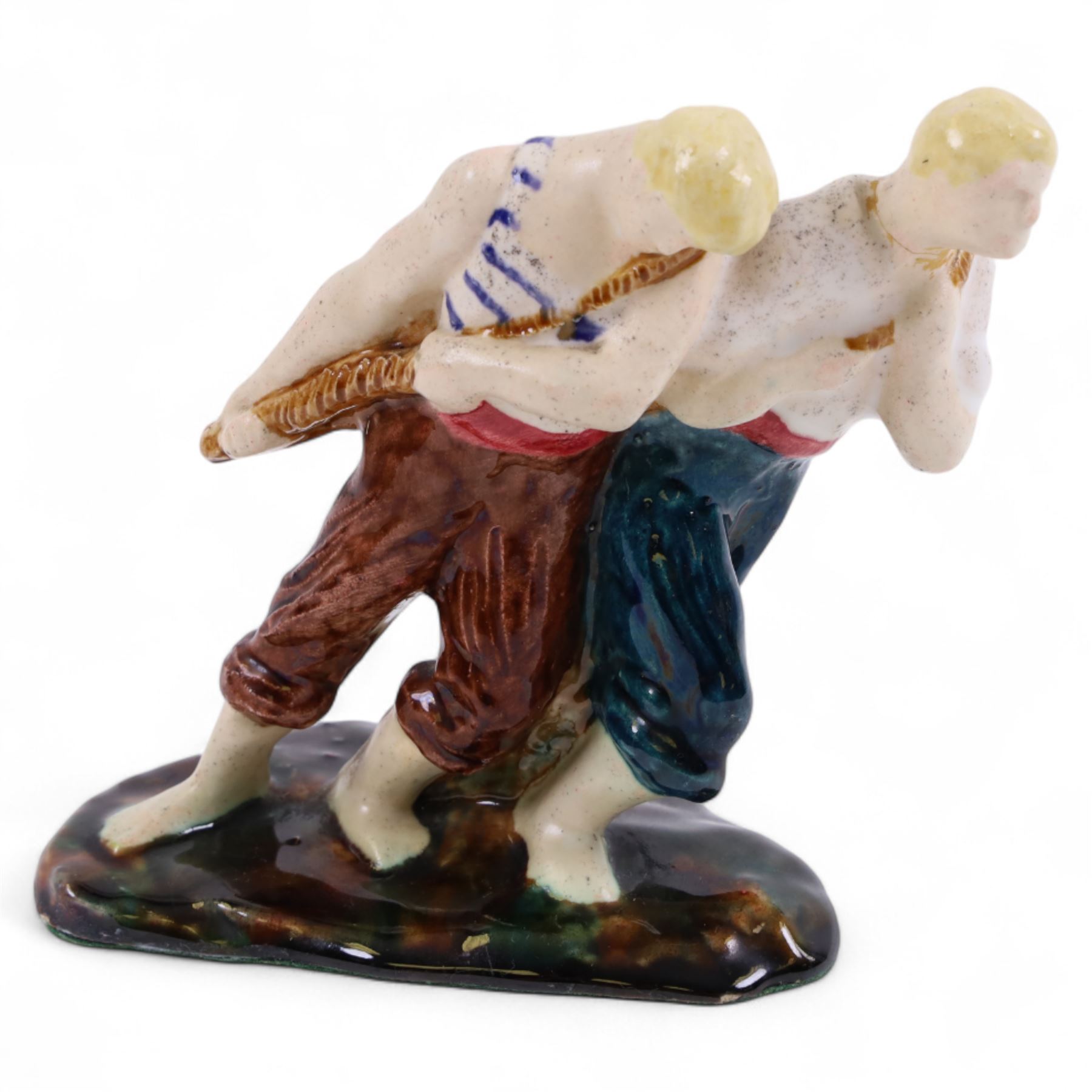 Guero figure group, modelled as two men, H14cm