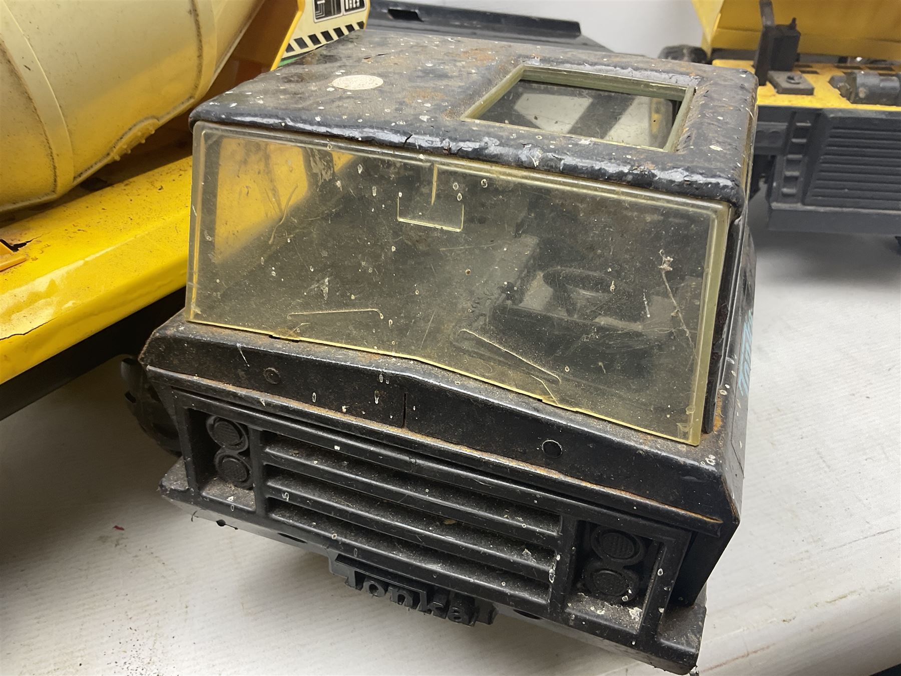 Tonka - five large scale steel pressed vehicles comprising Cement Mixer, Car Transporter, Mobile Crane and two Dumper Trucks (5)