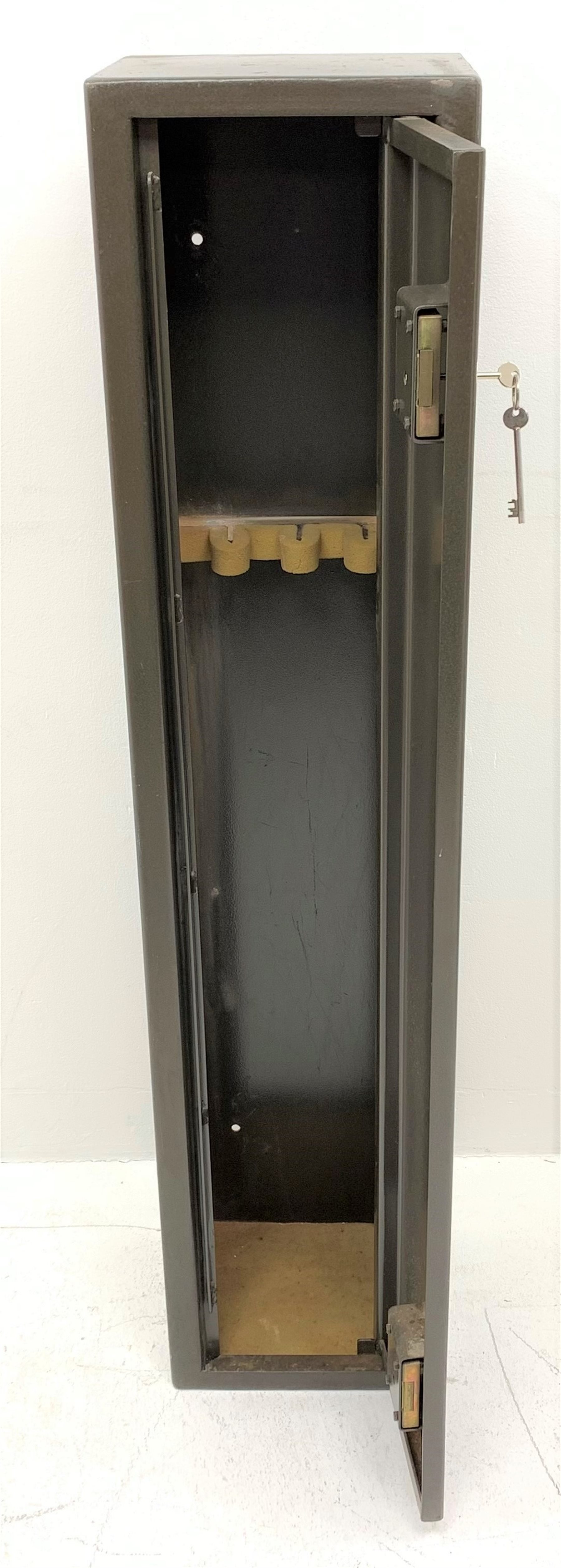 Steel gun with double locking single full length door and