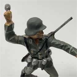 German Lineol Flak Artillery Gun on revolving base H11cm; four other Lineol WW2 German soldiers; and three Elastolin German soldiers including reclining radio operator (8)