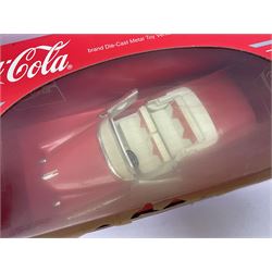 Seven 1:18 scale die-cast models by Ertl, Road legends, Maisto, Solido etc including two Coca Cola promotional vehicles; five boxed (7)