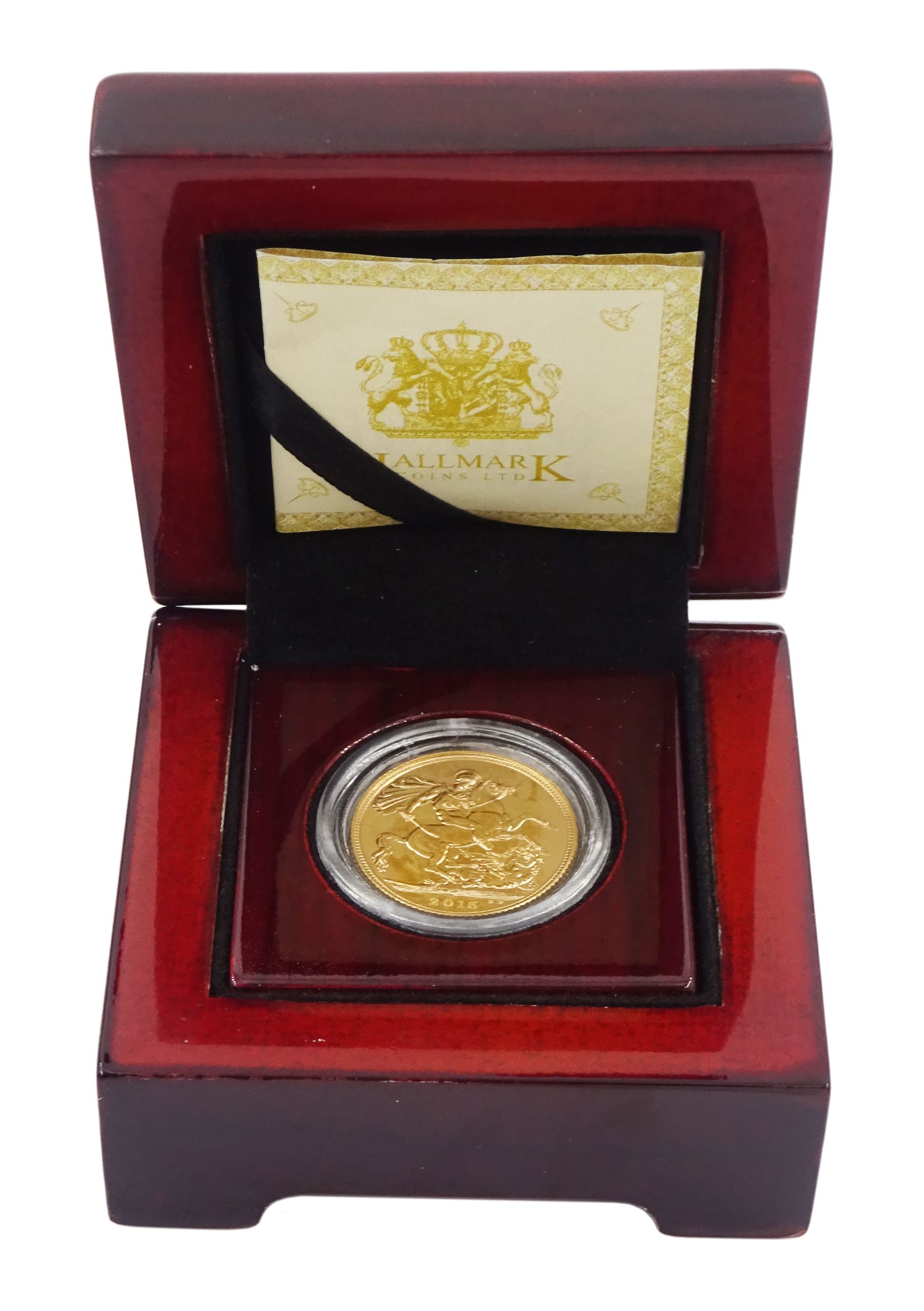 Queen Elizabeth II 2015 gold full sovereign coin, housed in a display case