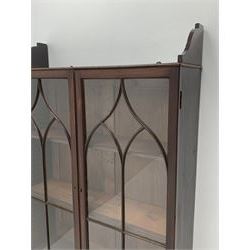 Georgian mahogany Gothic wall hanging cabinet, enclosed by two ogee pointed arch astragal glazed doors, plain sides with shaped top and bottom brackets