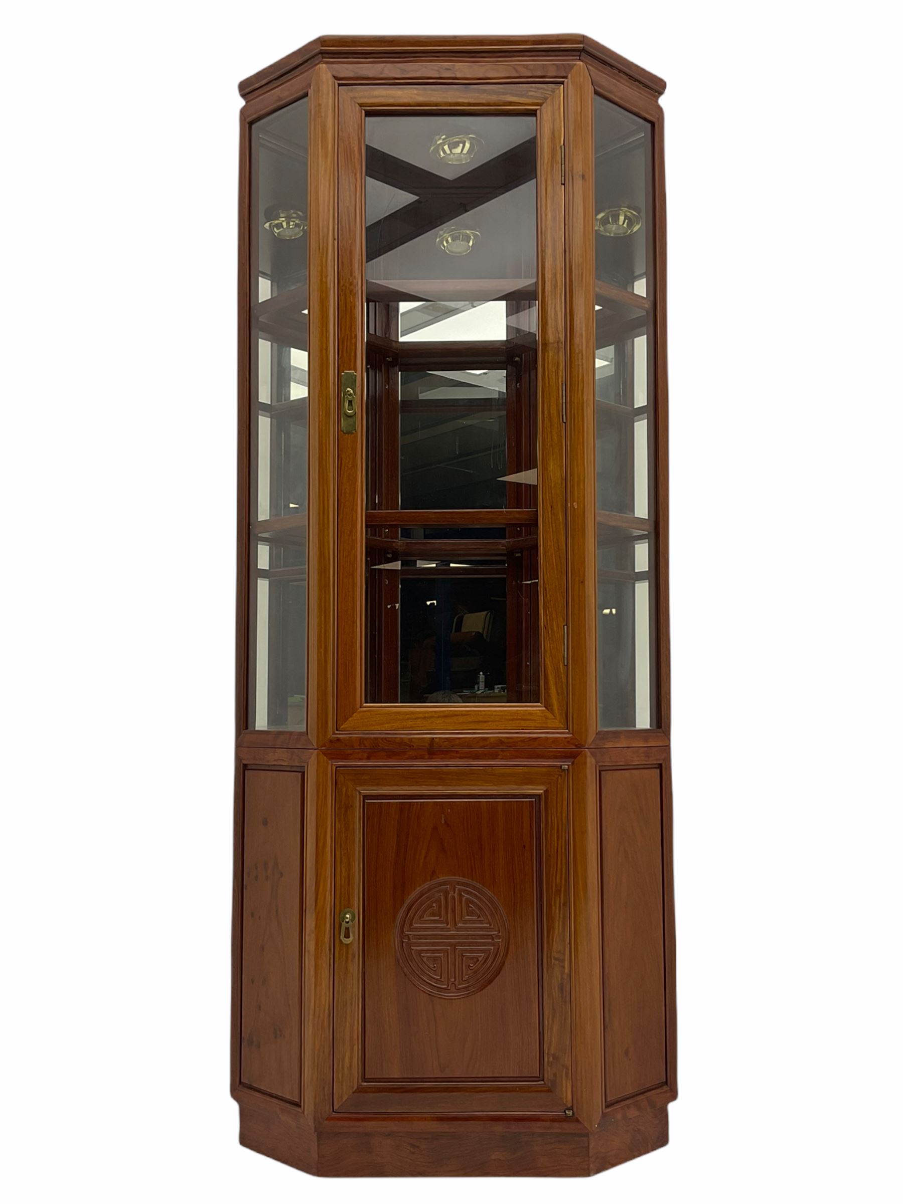 Chinese rosewood corner display cabinet, upper glazed illuminated cabinet above lower cupboard