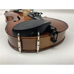 Three Stentor Student violins - three-quarter size with 33cm two-piece back; and two quarter size each with 28cm two-piece back; each in carrying case with bow (3)