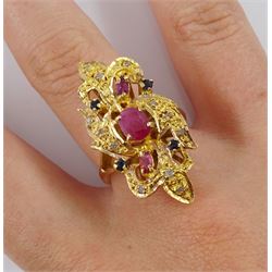 14ct gold vari-cut ruby, sapphire, diamond ring, in an open work setting