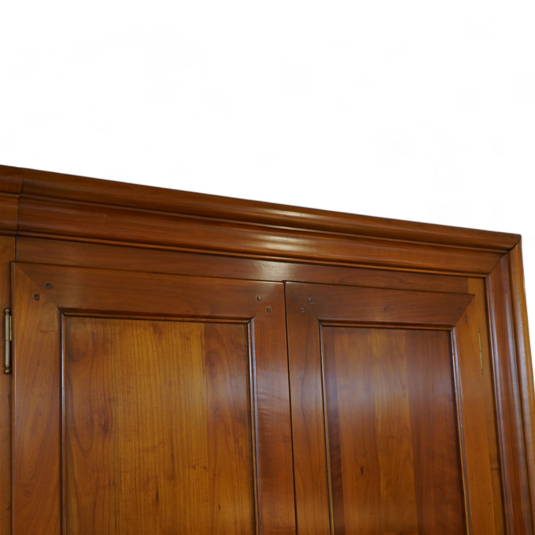 Brigitte Forestier - French cherry wood four door wardrobe unit, fitted with hanging and shelving