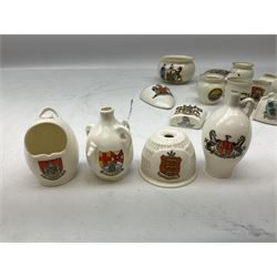 W H Goss crested china to include Guernsey lobster trap, Newcastle-on-Tyne wine flagon, Felixstowe water bottle, Dorchester salt pot etc