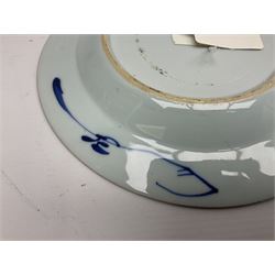 Japanese Meiji period Arita blue and white plate, of circular form, painted with riverside landscape and bird upon flowering branch, with character mark beneath, D24.5cm, together with two 18th century Chinese blue and white plates, each painted with floral design, each approximately D22.5cm