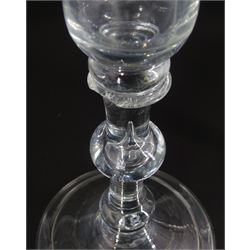 18th century drinking glass, the bell shaped bowl upon a triple knopped stem and folded conical foot, H18cm, together with a further 18th century drinking glass, the funnel bowl upon a basal knopped stem and folded conical foot, H15.5cm