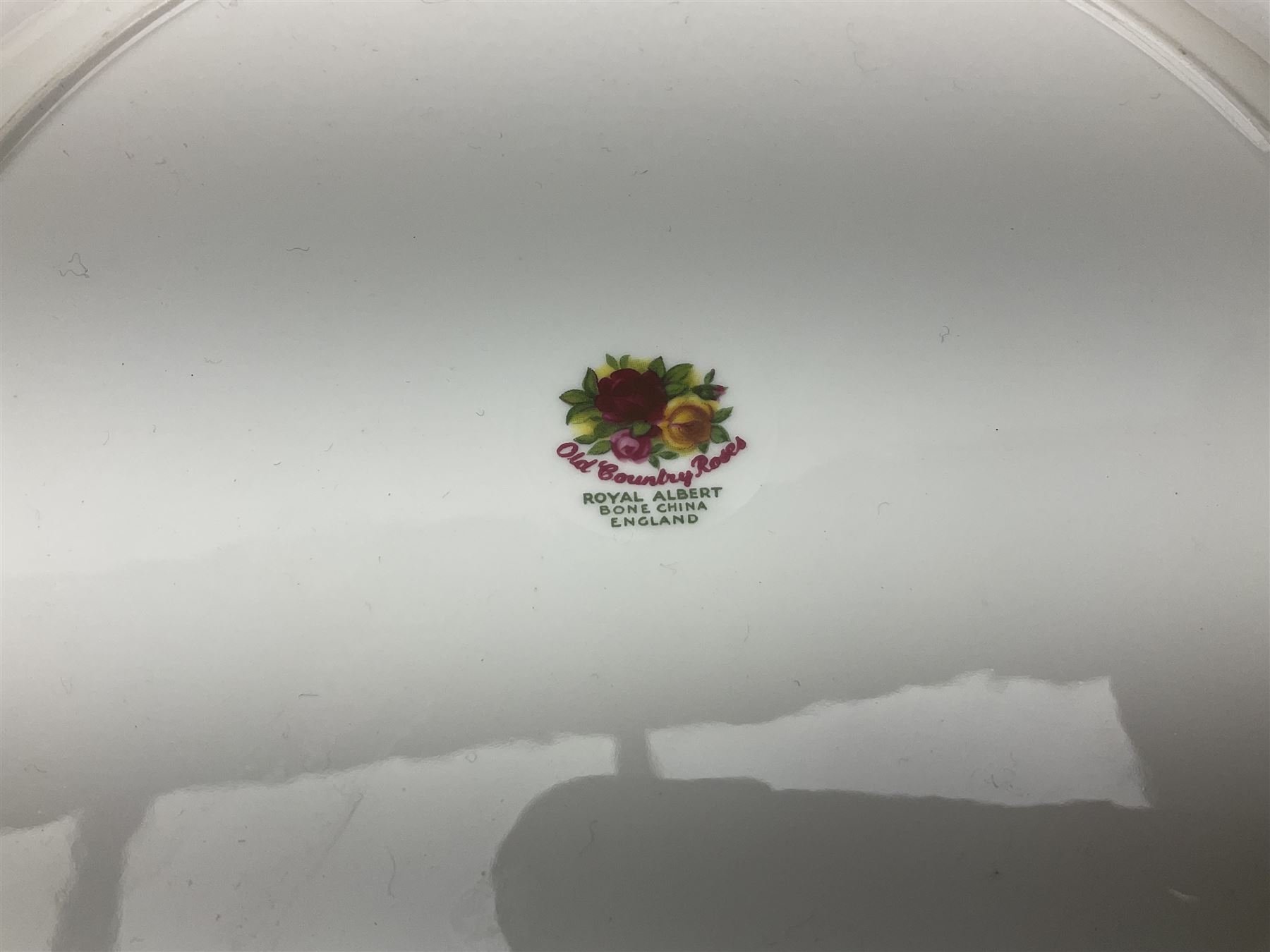 Royal Albert Old Country Roses pattern tea set, comprising teapot, coffee pot, six teacups and six saucers, five side plates, further teacup with joined saucer and side plate, open sucrier, milk jug, cake plate, and preserve pot and cover, together with Royal Albert Jubilee Rose pattern sauce boat and stand, and Royal Albert Lavender Rose pattern cake stand. 