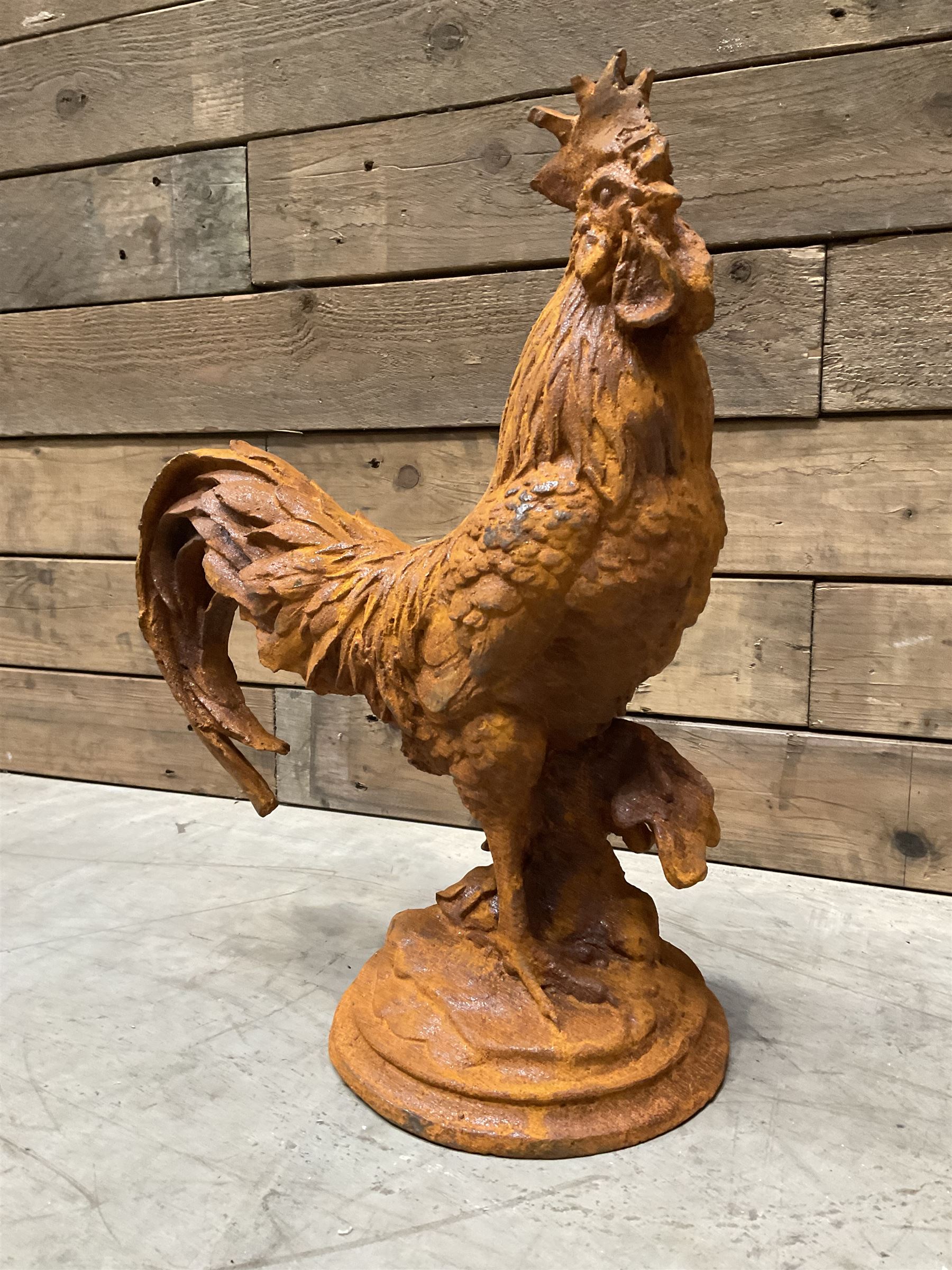 Small weathered cast iron garden cockerel