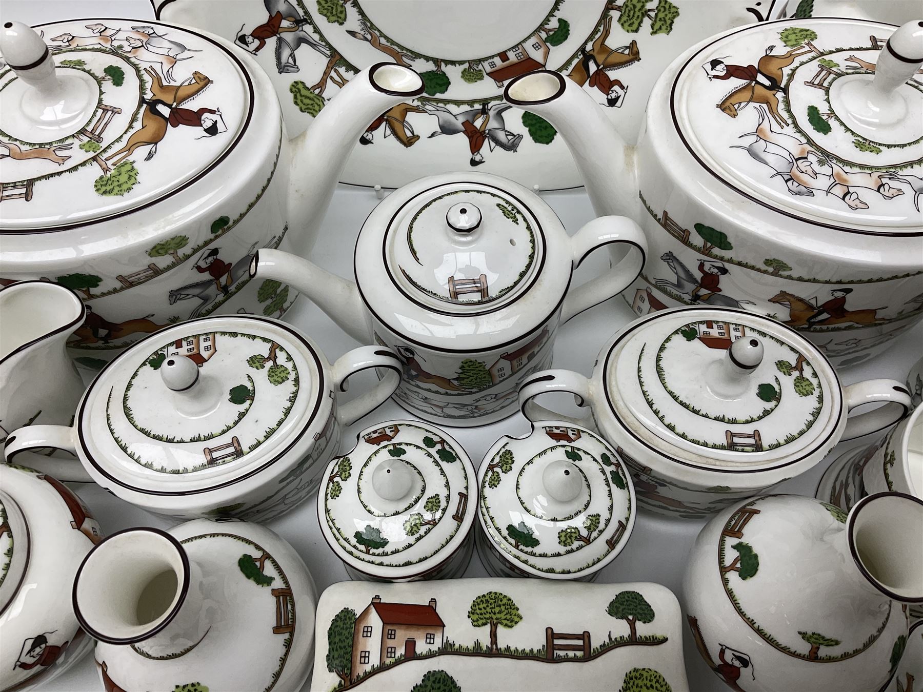 Wedgwood Hunting Scenes dinner and tea service for ten, to include dinner plates, side plates, dessert plates, cups and saucers, mugs, two large teapots, two milk jugs, etc, together with matching items by coalport and Staffordshire (94)