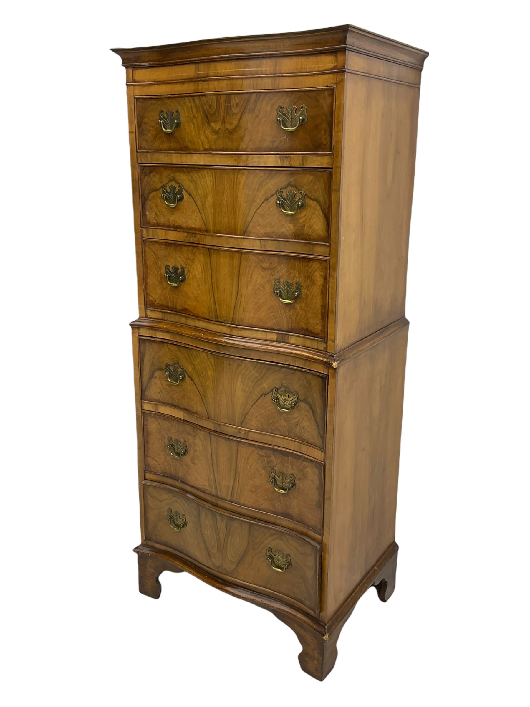 Burton Reproductions walnut chest on chest, fitted with six serpentine drawers