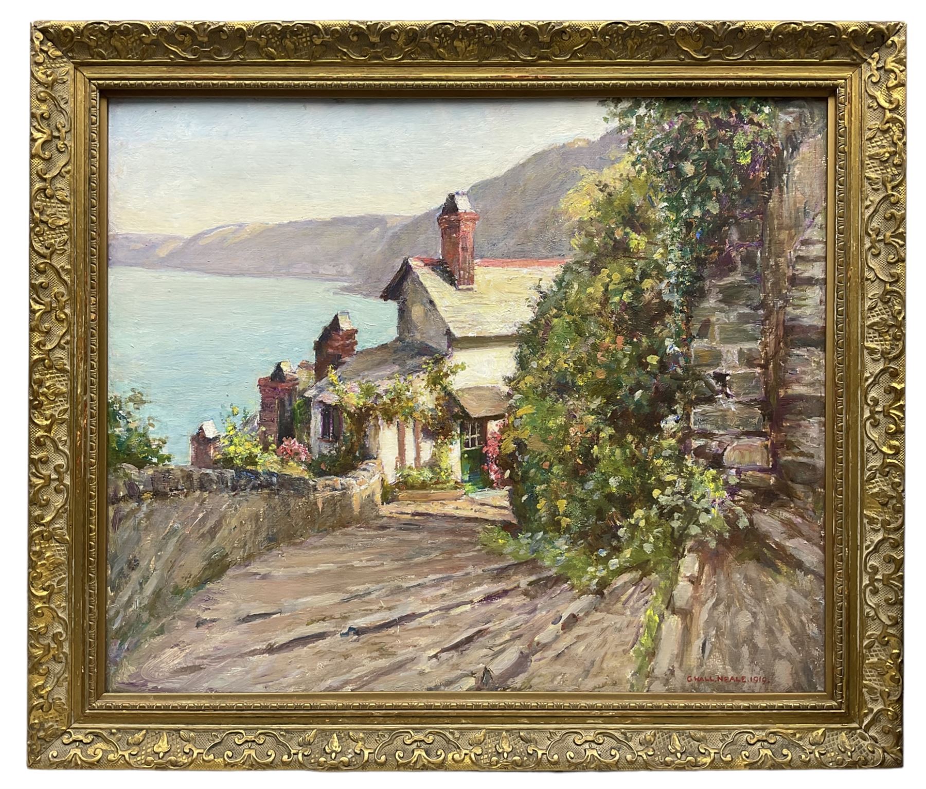George Hall Neale (British 1863-1940): 'Clovelly - Up and Down Along', oil on board signed and dated 1919, original label verso 37cm x 45cm