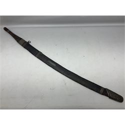 Omani presentation sword kattara, with 77cm  broad slightly curved single edge blade with two fullers, leather bound hilt woven with silver wire decoration and iron pommel;  in tooled leather scabbard with chased silver mounts and presentation plaque 'To Capt. D.M. Naylor From C Company NFR Oman Dec 1962' (Northern Frontier Regiment) L99cm overall