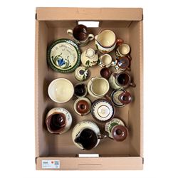 Collection of Torquay and similar Motto ware, including jugs, candlesticks, twin handled mug etc 