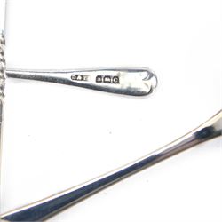 Group of silver, comprising two rectangular photograph frames, two pencil holders, boxed spoon and souvenir spoons, all hallmarked 