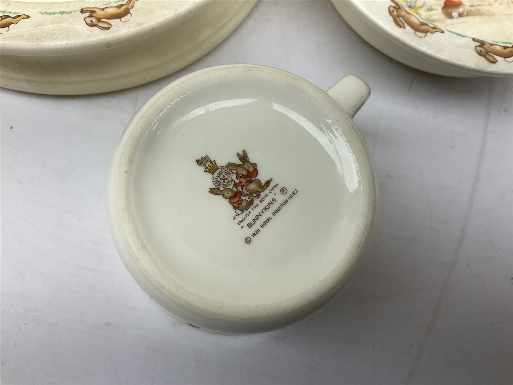 Royal Doulton Brambly Hedge plates comprising Crabapple Cottage, Spring and Summer, together with Royal Doulton Bunnykins nursery plate, bowl, cup etc