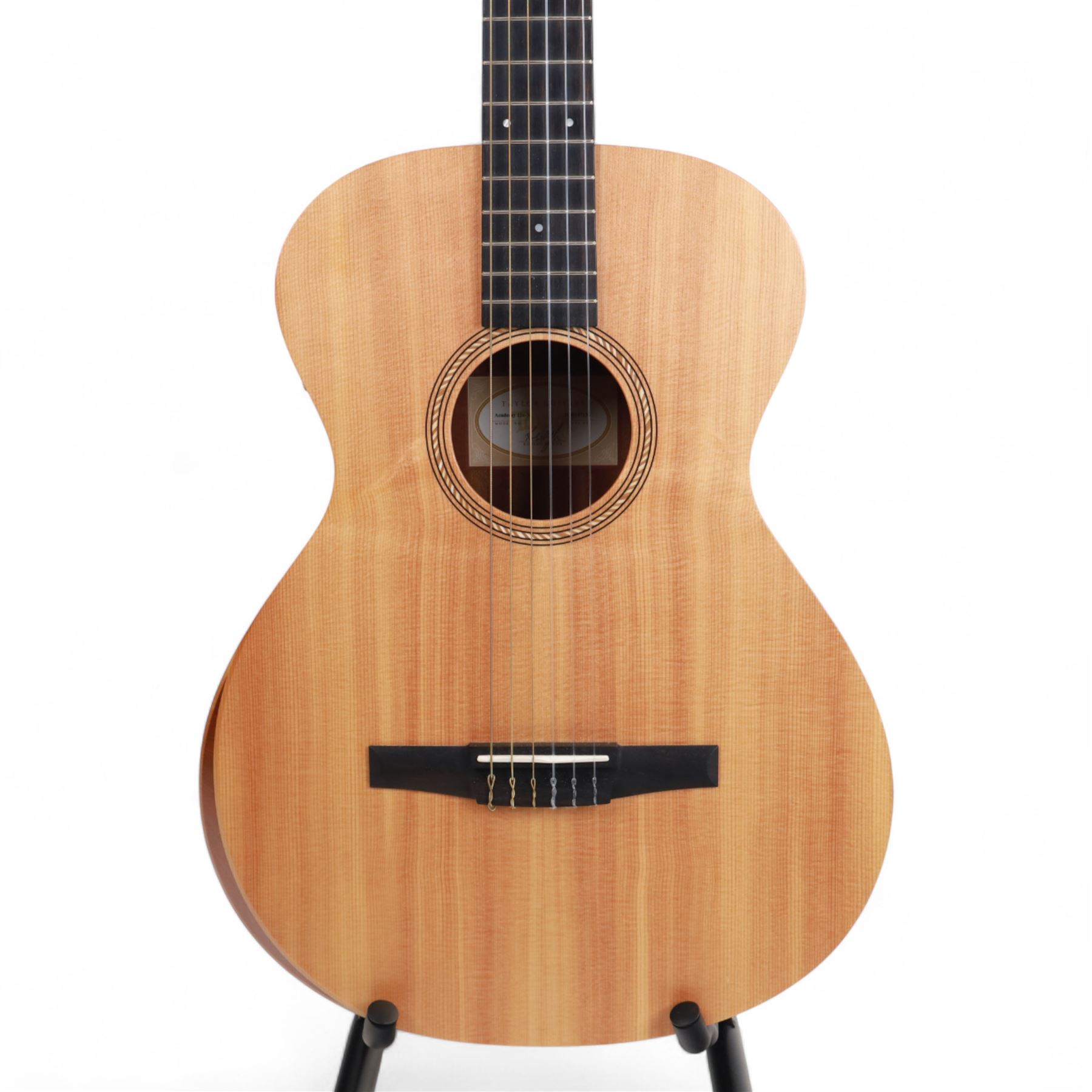 2020 Taylor Academy 12E-N nylon string electro-acoustic guitar; with sapele body, natural spruce top with contour edge and ebony fretboard, in original Taylor soft case, guitar L99cm