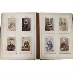 Two Victorian photograph albums, containing a collection of full and portrait Cartes de Visite, photographs and other ephemera