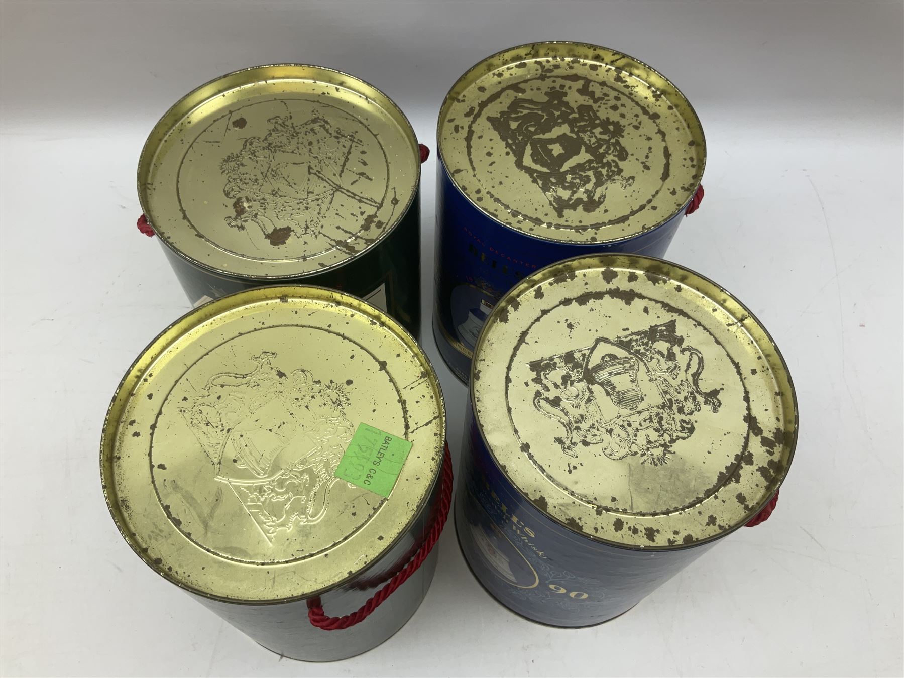 Bells, Scotch whisky, in seven Wade ceramic decanters, comprising two Christmas decanters 1990 and 1991, 60th birthday of Queen Elizabeth II decanter, Golden Wedding anniversary of the Queen and the Duke of Edinburgh decanter, Birth of Princess Beatrice decanter, Birth of Princess Eugenie decanter and Queen's mothers, together with Bells, blended Scotch whiskies, three miniatures in Wade ceramic decanters, various contents and proofs