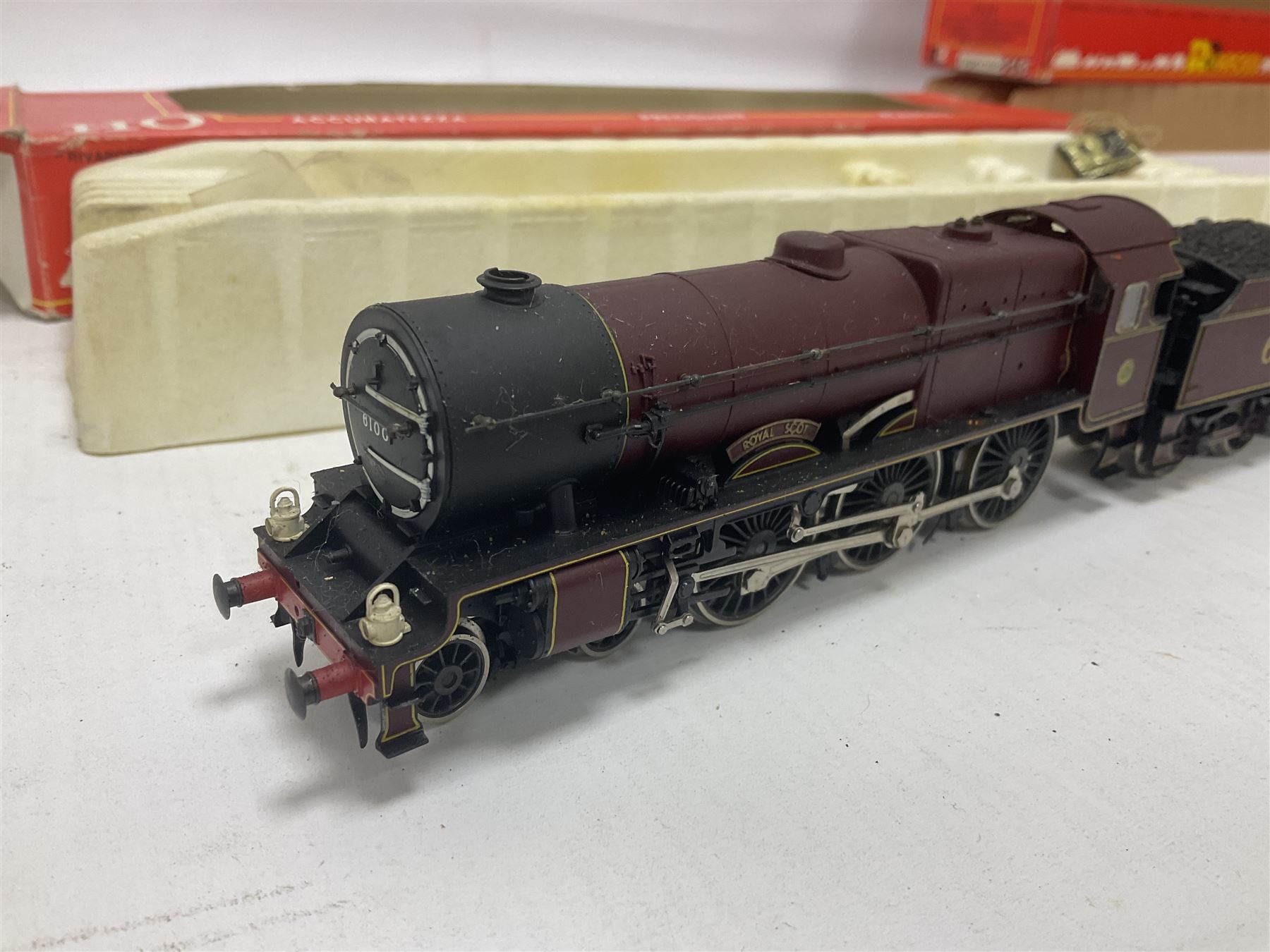 Rivarossi ‘HO’ gauge - 1348 4-6-0 ‘Royal Scot’ steam locomotive and tender no.6100 and four carriages comprising 2933, two 2934 and 2935 in maroon; in original boxes (5) 
