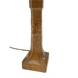 'Mouseman' tooled oak table lamp, the octagonal tapered stem carved with mouse signature, with shade, by Robert Thompson of Kilburn