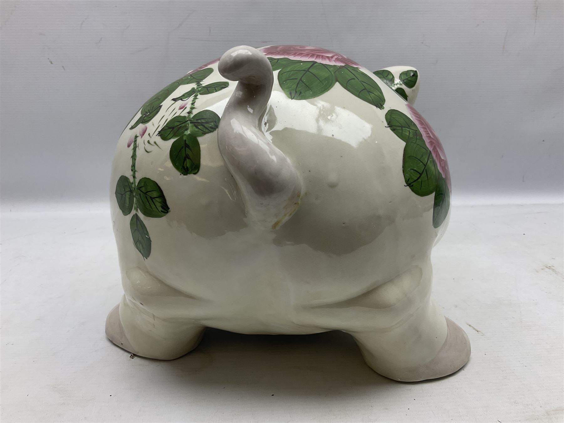 Large ceramic figure of a pig decorated with roses, L45cm