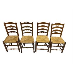 Harlequin set of nine country elm and beech chairs - pair 19th century spindle back carver armchairs with wingbacks, and a mixed set of seven ladderback side chairs, all with rush seats