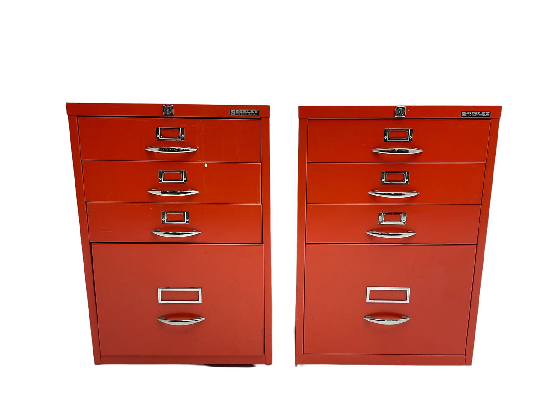 Two red finish 'Bisley' four drawer filing cabinet
