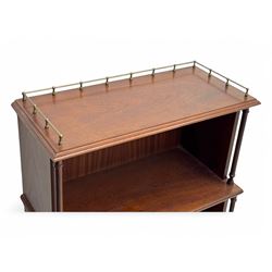 Mid-20th century mahogany open bookshelf, the rectangular top with a brass balustrade gallery, over three shelves each supported by turned column uprights, on shaped apron base