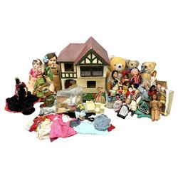 Mock Tudor style two storey dolls house with wood and plastic accessories and furniture, quantity of dolls and three stuffed teddy bears