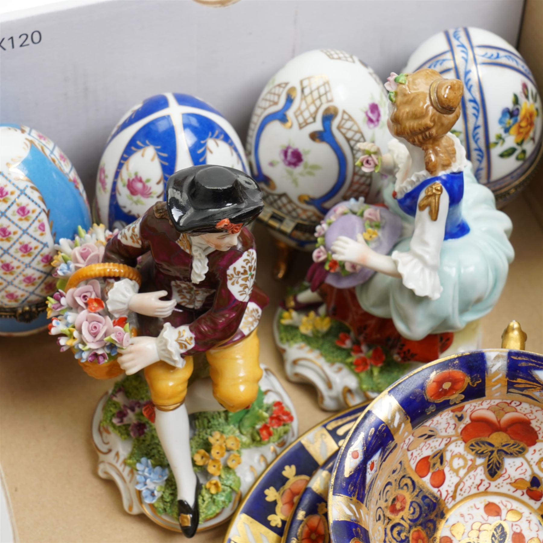 Silver bottle coaster, four limoges egg trinket boxes, two sitzendorf figures, and a Pointons imari trio