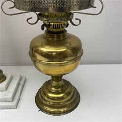 Brass Corinthian column oil lamp, upon stepped marble base, together three other brass table lamps, tallest H68cm