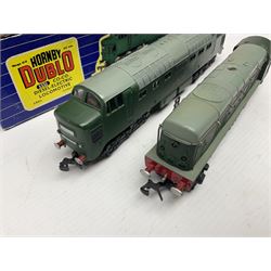 Hornby Dublo - three-rail - Deltic Type Diesel Co-Co locomotive with instructions and guarantee; and Class 20 1000 B.H.P. Bo-Bo Diesel Electric locomotive No.D8000; both in BR green; and each in original blue striped box (2)

