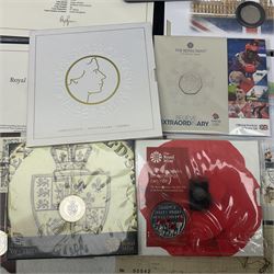 Mostly commemorative coinage, including various Queen Elizabeth II United Kingdom brilliant uncirculated fifty pence, two pound and five pound coins in card folders, The Royal Mint United Kingdom 2012 proof coin set, Alderney 2021 'Royal National Lifeboat Institution' five pound coin cover in Harrington and Byrne folder etc